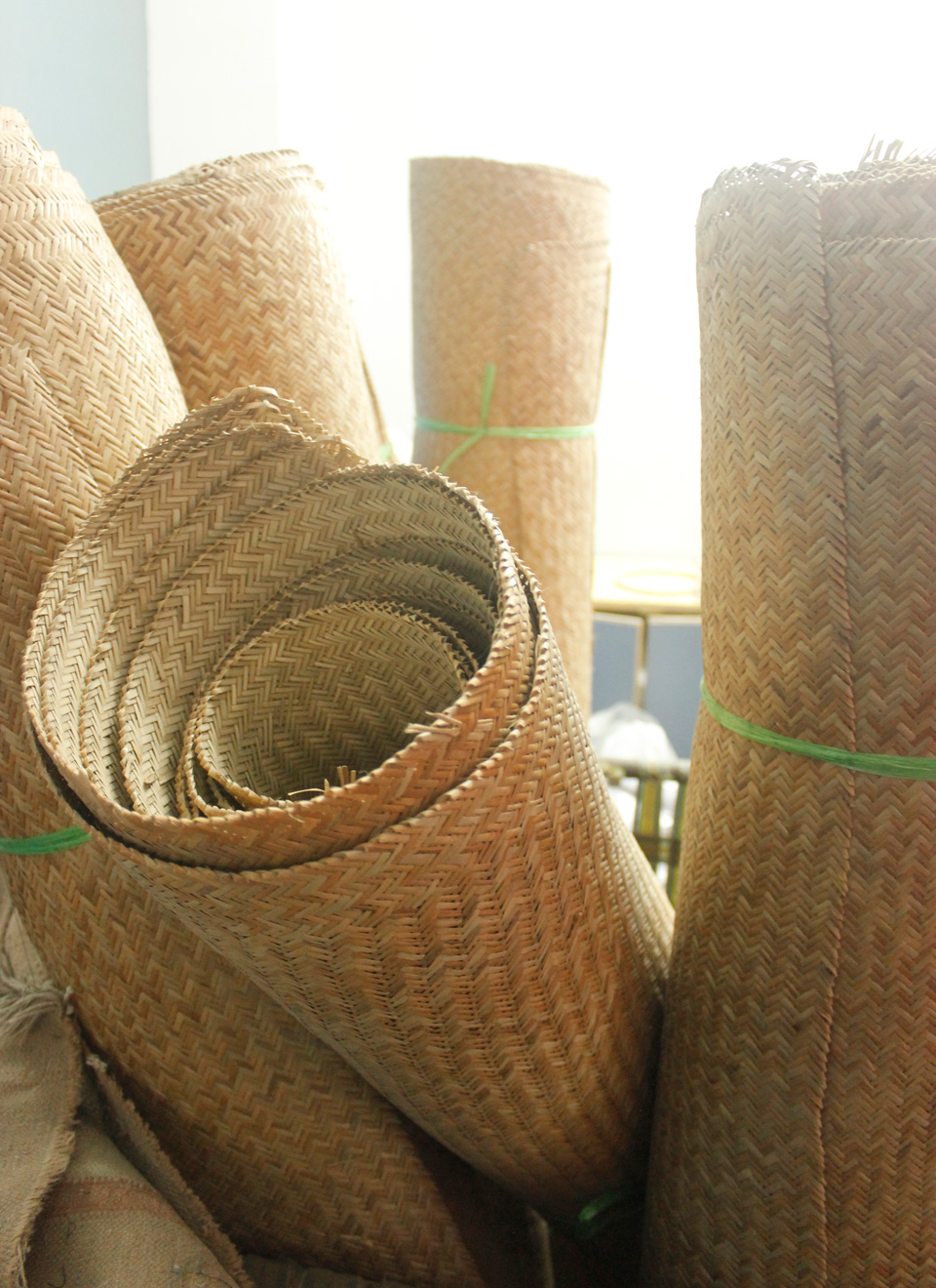 bamboo strips woven into lengths, used as the base fabric for handbags.