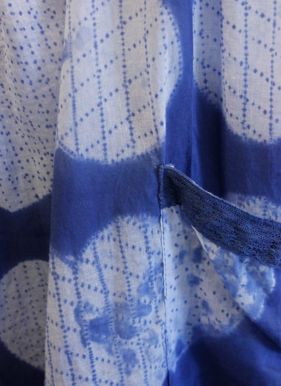 a tie and dye technique called 'shibori' (a Japanese term) - dyed here to show heart shapes. 